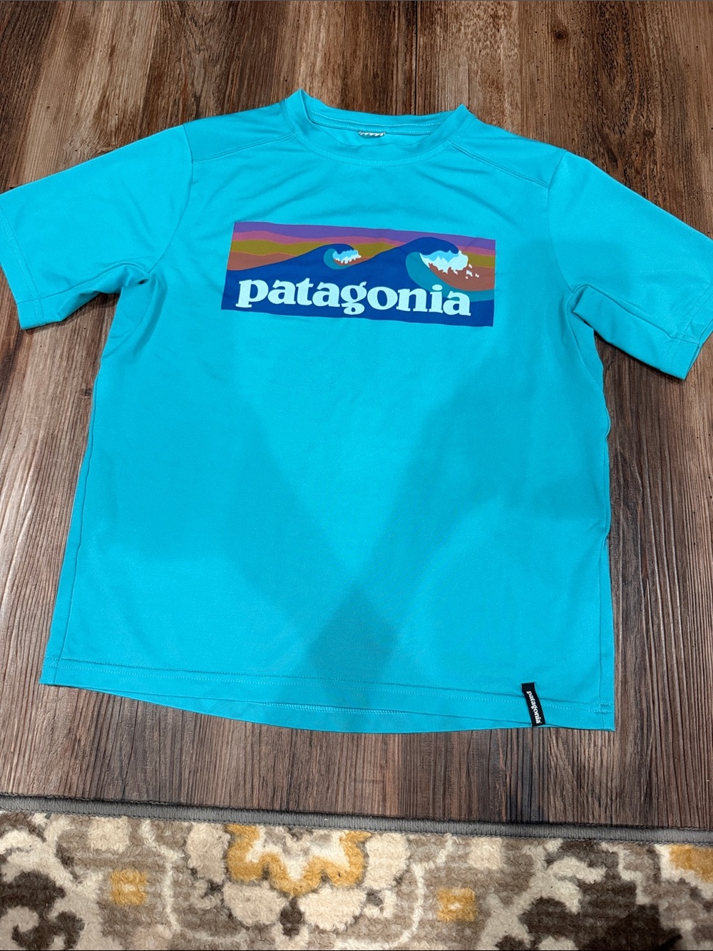 Patagonia Kids Short-Sleeve Tee in Bright Turquoise with Multicolor Logo